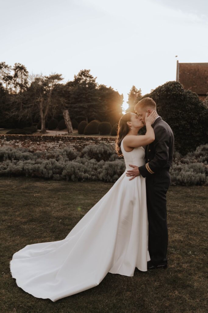 Golden hour couple portraits of a bride and groom at Seckford Hall in Woodbridge, Suffolk