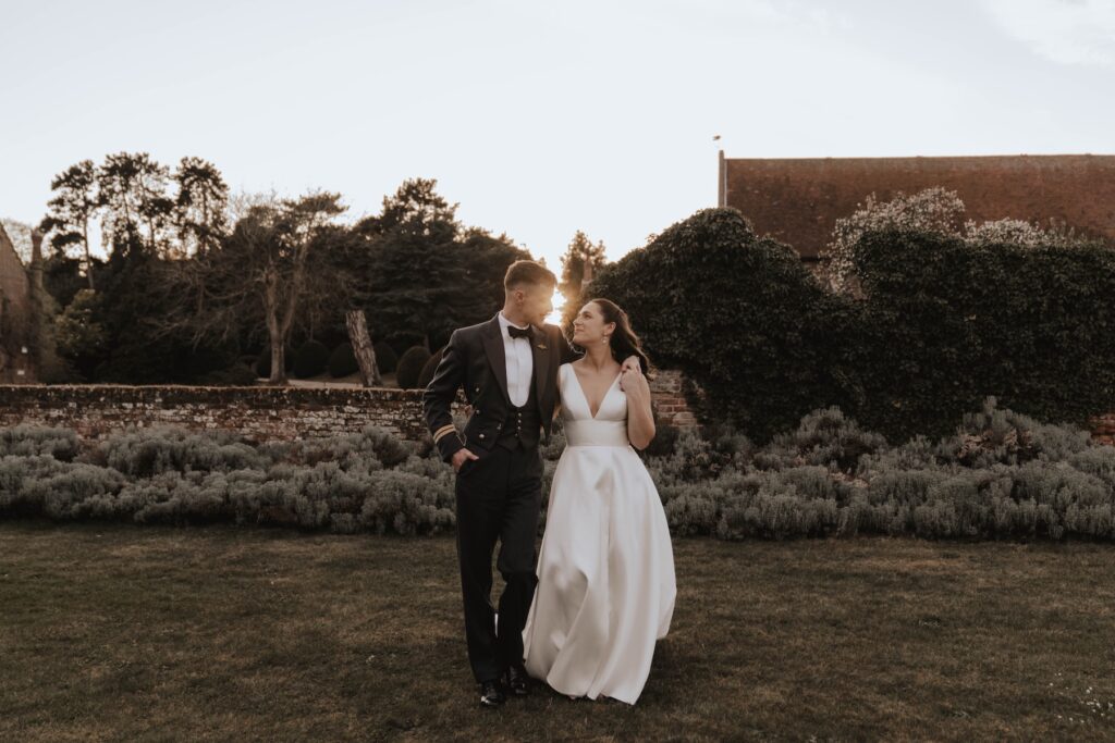 Golden hour couple portraits of a bride and groom at Seckford Hall