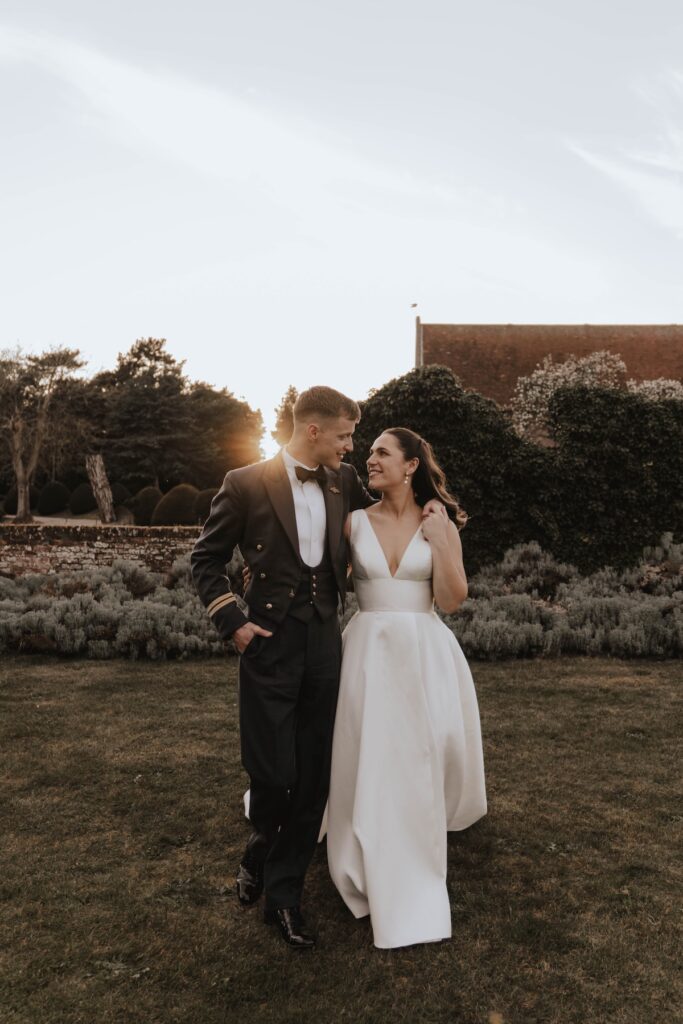Golden hour couple portraits of a bride and groom at Seckford Hall