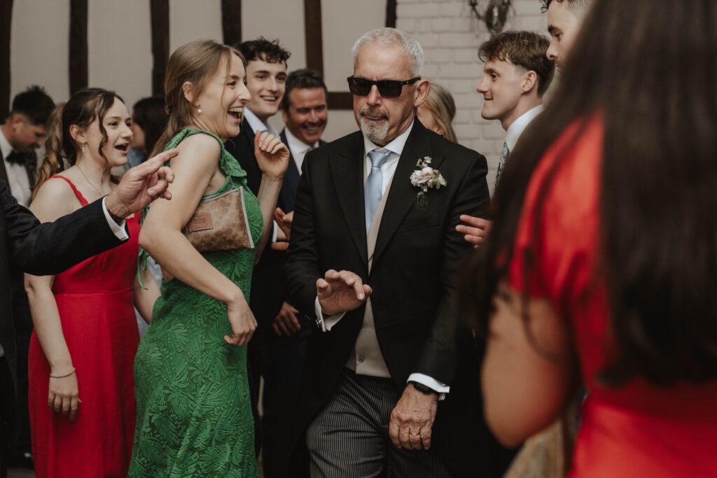 Guests on the dance floor during a wedding evening at Seckford Hall