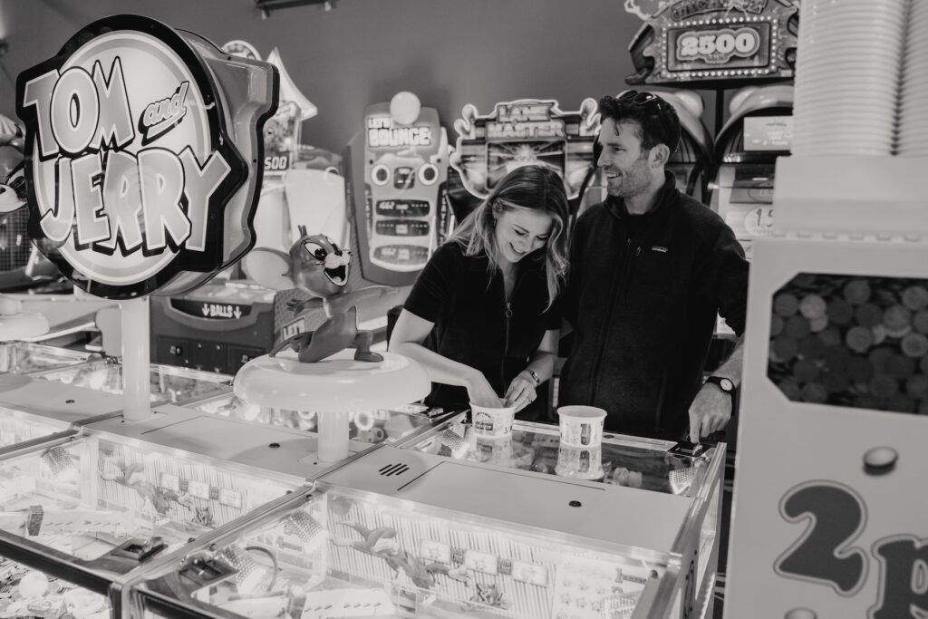 Suffolk couple being captured playing with the Felixstowe arcade machines