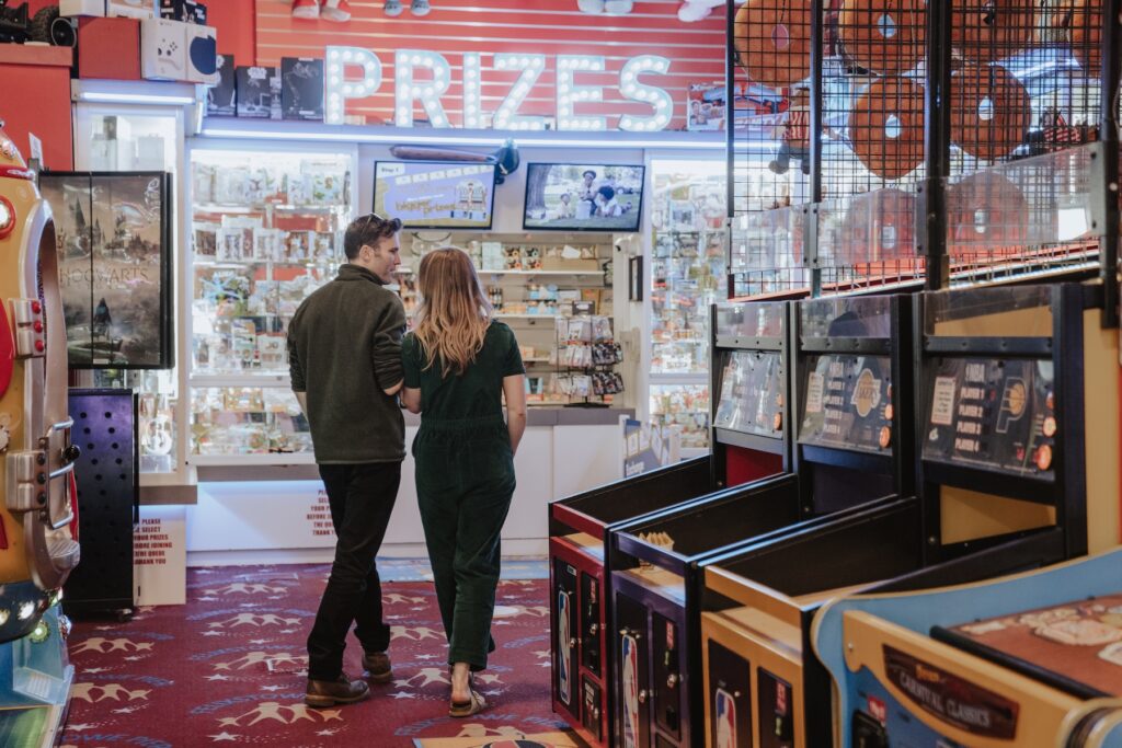 Suffolk wedding photographer capturing an engagement session on Felixstowe pier