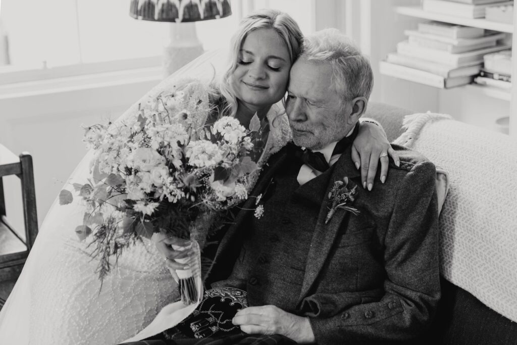 Emotional first look between bride and her father at Dunglass Estate