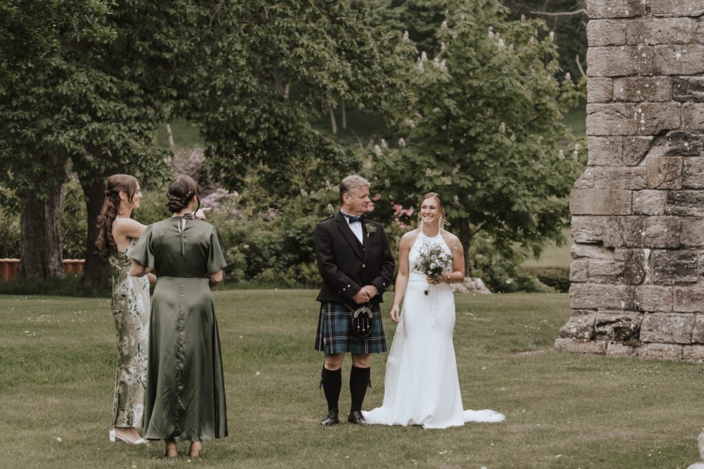 Bride waiting to walk down the aisle at Dunglass Estate