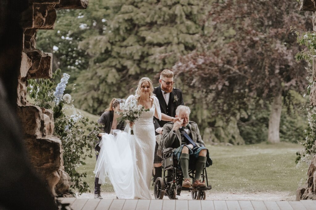 Bride walking down the aisle at Dunglass Estate wedding