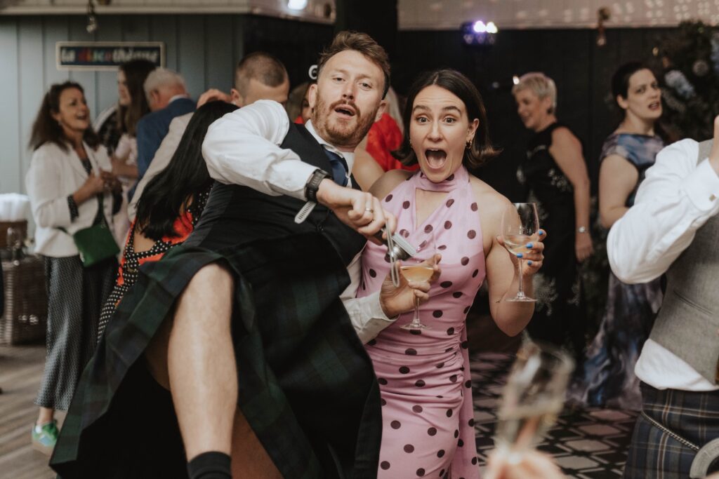 Guests enjoying ceilidh dancing at Dunglass Estate