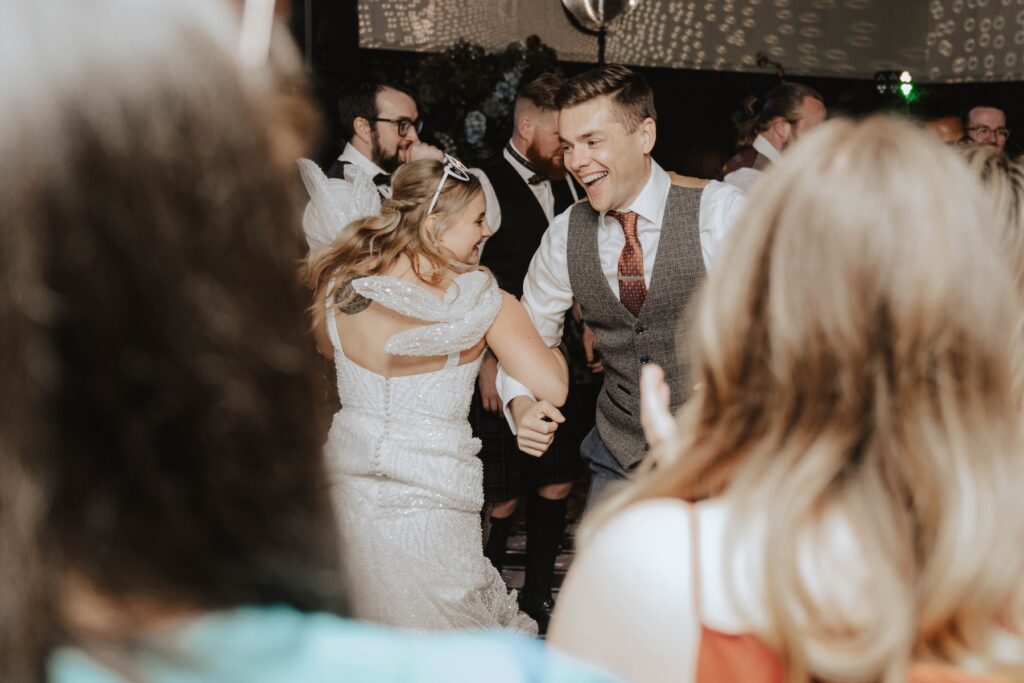 Wedding party dancing at Dunglass Estate reception