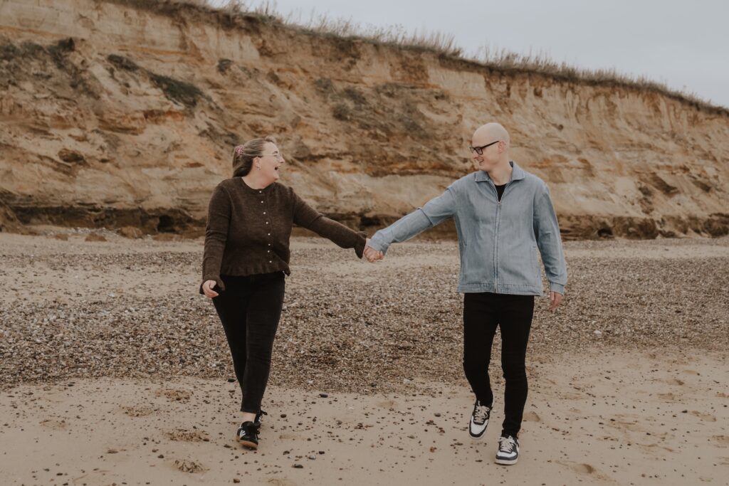 A couple having their engagement session in Suffolk