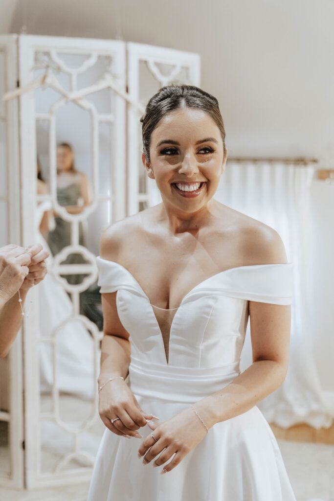 Abbie looking beautiful in her wedding gown at Gaynes Park