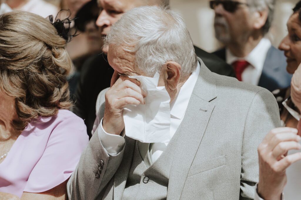 Guests becoming emotional during Abbie and Josh's wedding ceremony