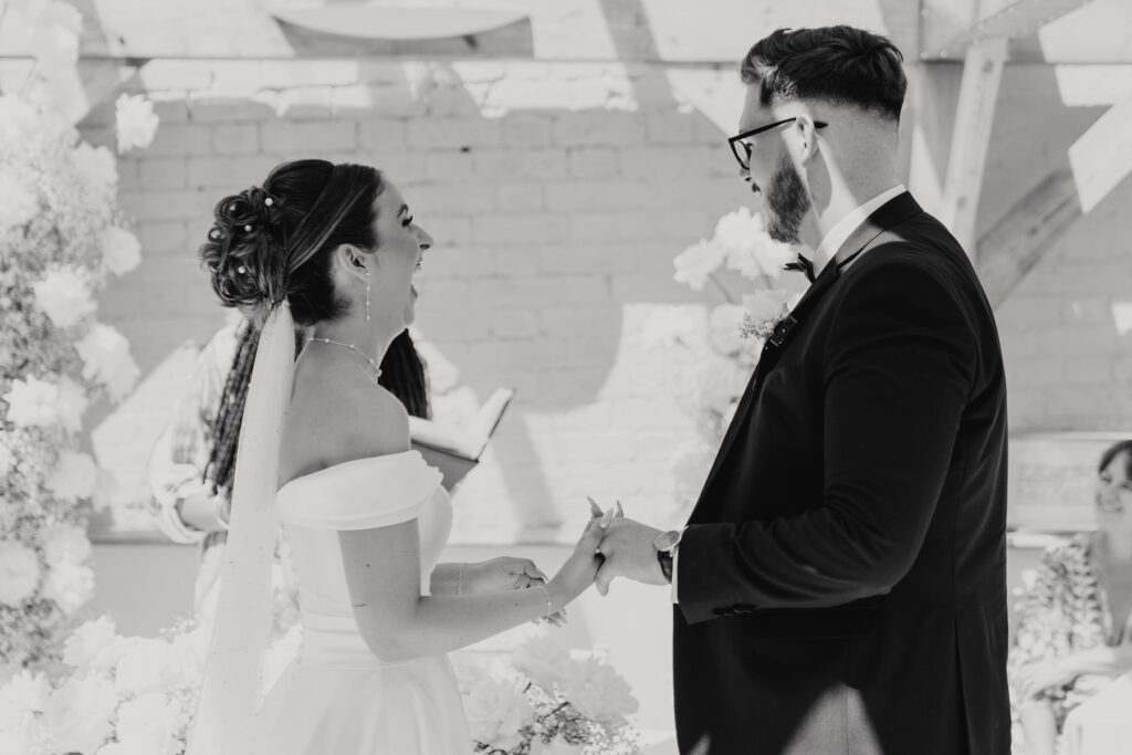 Bride and groom during their emotional Orangery ceremony in Essex
