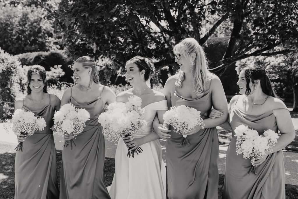 Fun bridesmaid photograph at a Gaynes Park wedding in Essex