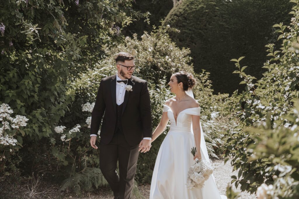 Newlyweds enjoying five minutes together away from their wedding guests