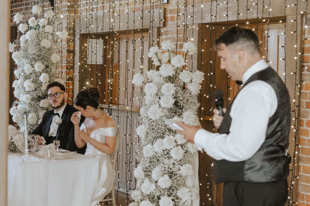 Candid reaction to a funny wedding speech at Gaynes Park
