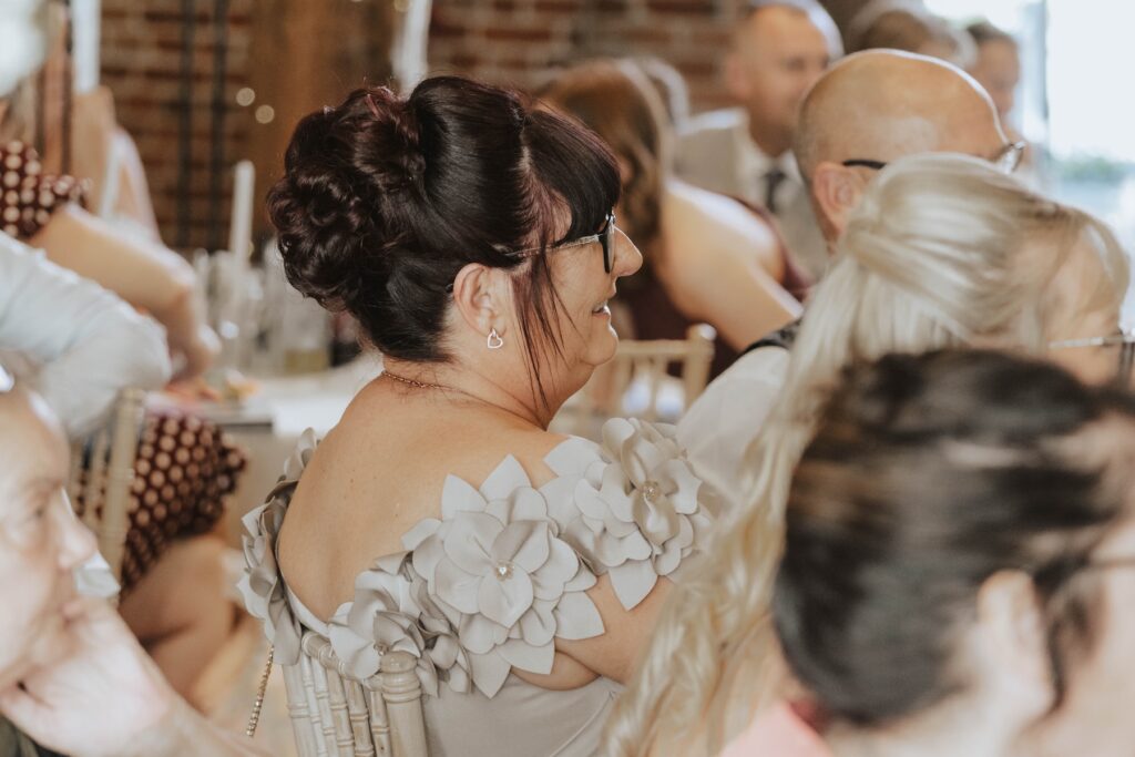Candid expressions to a funny wedding speech at Gaynes Park