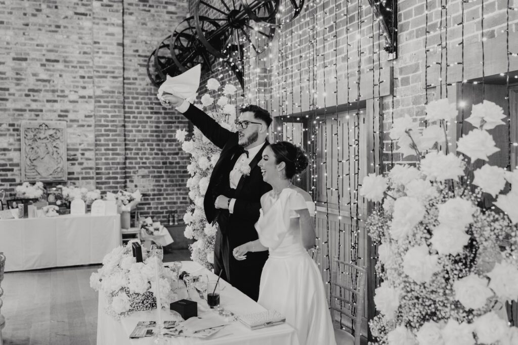Singing waiter entertaining guests at Abbie and Josh's Gaynes Park wedding