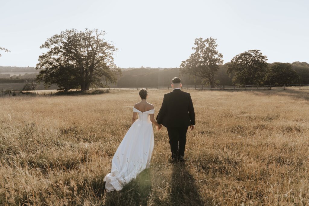 Abbie and Josh during golden hour at Gaynes Park