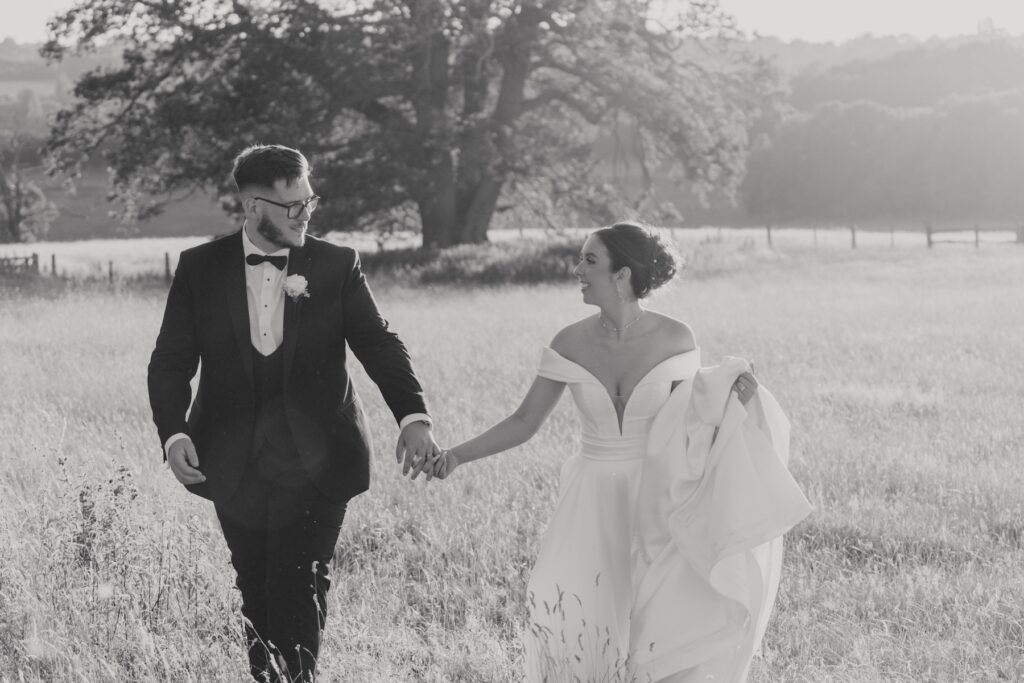 Romantic newlywed portrait during golden hour at Gaynes Park