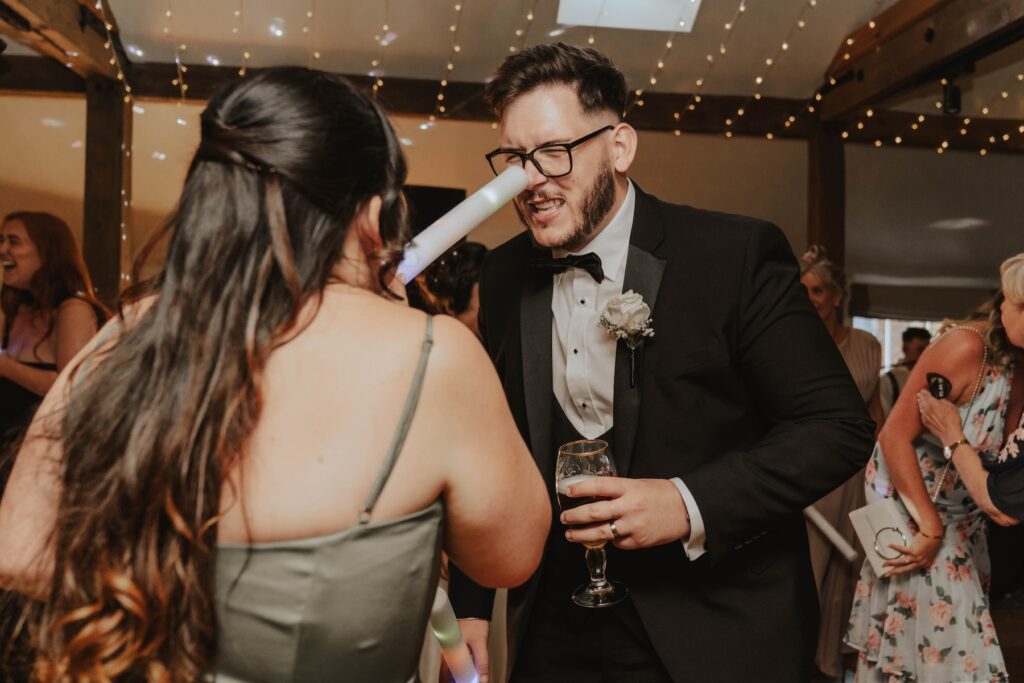 Live wedding band performing at a summer wedding at Gaynes Park