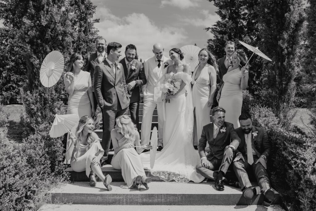 Wedding group photograph in the gardens at Marquis Suffolk in Suffolk