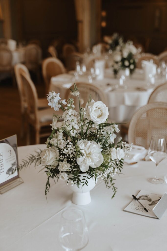 Elegant wedding table decorations at Lauren and James' Marquis Suffolk wedding
