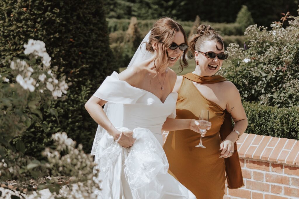 Wedding guests enjoying the sunshine at Marquis Suffolk