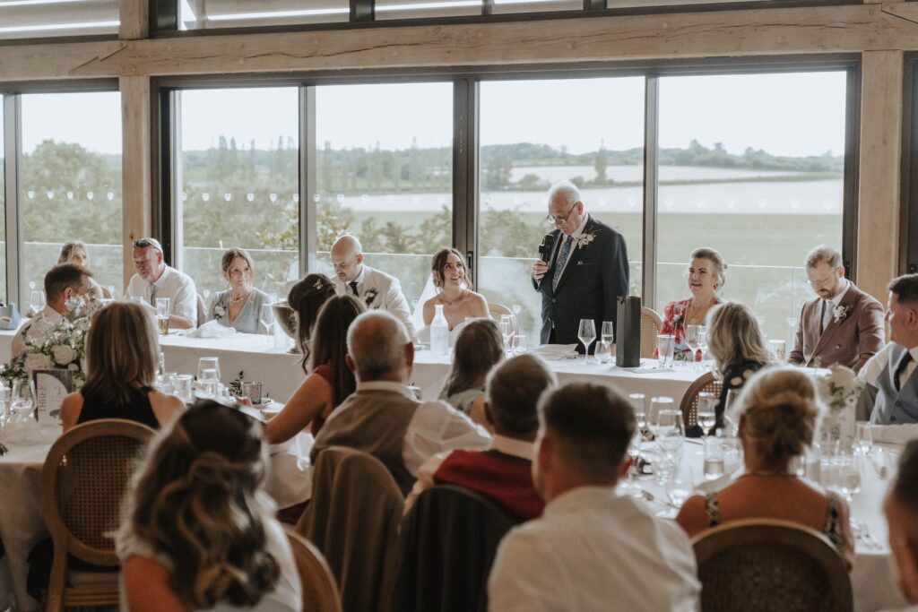 Lauren's father giving his speech during the wedding breakfast at Marquis Suffolk