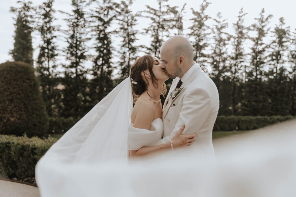 Newlyweds enjoying a quiet moment together during their Suffolk wedding