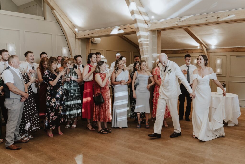 Lauren and James sharing their first dance at Marquis Suffolk