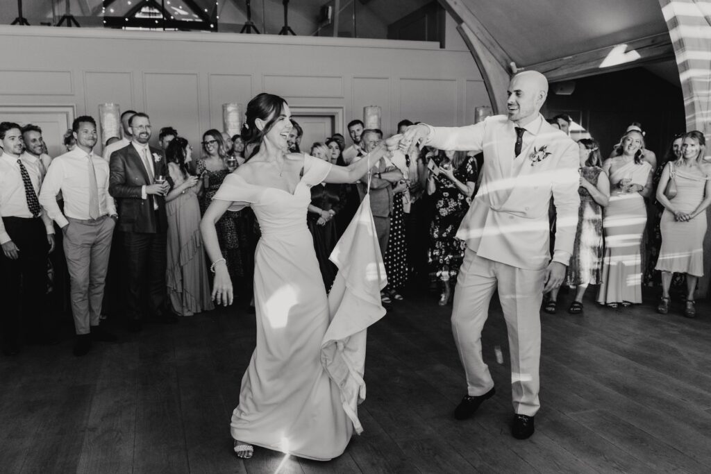 Bride and groom dancing together during their first dance
