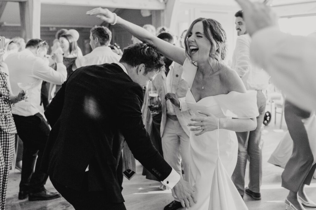 Lauren dancing with her wedding guests at Marquis Suffolk