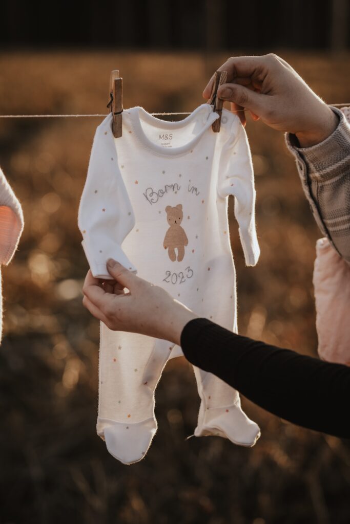 The Carters enjoying a golden hour maternity session at Thetford Forest in Suffolk