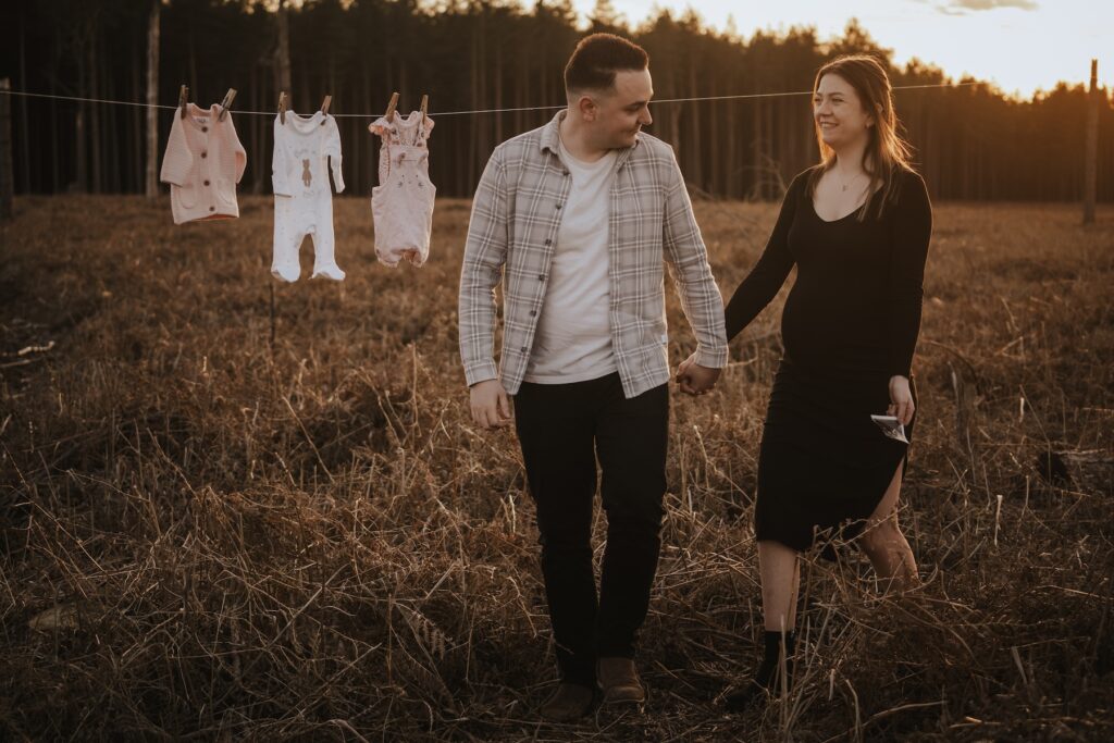 The Carters sharing a quiet moment together among the trees at Thetford Forest