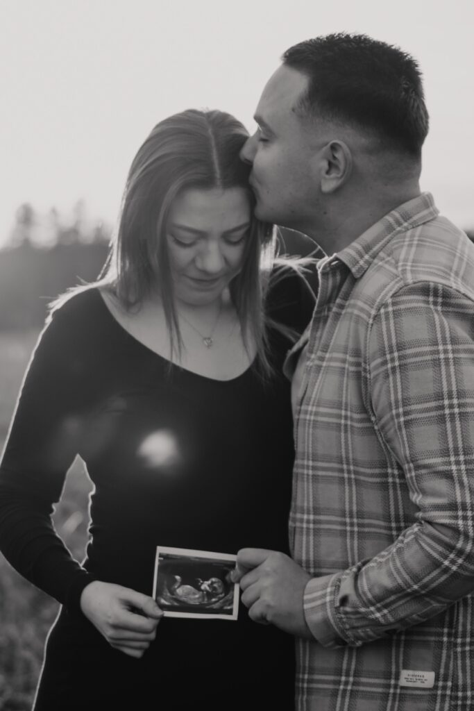 Natural maternity portrait of a pregnant woman at Thetford Forest in Suffolk